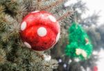 Red Christmas Ball On The Christmas Tree Stock Photo