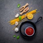 Italian Food And Menu Concept. Spaghetti With Ingredients Sweet Stock Photo