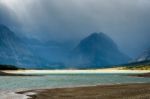 Storm Clouds Gathering Over Lake Sherburne Stock Photo