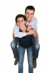 Sister Gives Piggyback Stock Photo