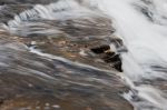 Beautiful Small Waterfalls Of A Fast Creek In Fall Stock Photo