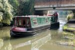 Narrow Boat On The River Wey Navigations Canal Stock Photo