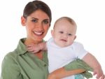 Happy Young Mother Carrying Baby Boy Stock Photo