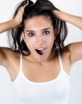 Young Surprised Woman Holding Her Face Stock Photo