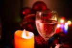 Two Glasses Of Champagne With A Christmas Decor In The Background Stock Photo