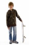 Front View Of Boy Holding Skate Stock Photo