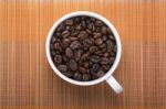 Coffe Bean In Cup Stock Photo