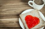 Delicious Slice Of Bread With Strawberry Jam Heart Shape Stock Photo