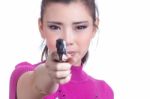 Asian Woman With A Gun Stock Photo