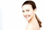 Smiling Woman With Bare Shoulders Stock Photo