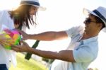 Young Couple Having Fun In A Park Stock Photo