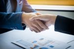 Two Businessman Shaking Hands During A Meeting In The Office, Su Stock Photo