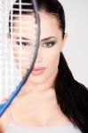 Pretty Woman With Tennis Racket Stock Photo