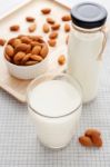 Almond Milk In Glass And Bottle Stock Photo