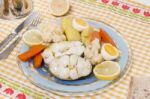 Hake Fish With Cauliflower And Potatoes Stock Photo