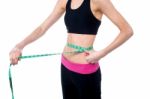 Woman Measuring Her Waist Stock Photo