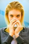 Close-up Of Blonde Young Woman Drinking Tea Stock Photo