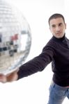 Man Holding Disco Ball Stock Photo