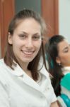 Dentist Examining A Patient's Teeth In The Dentist Stock Photo