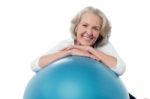 Senior Woman Posing With Exercise Ball Stock Photo