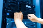 Man Fix Server Network In Data Center Room Stock Photo