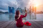 Young Woman Take A Photos In Singapore Stock Photo