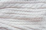 White Knit Fabric Background Stock Photo