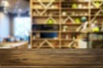 Selected Focus Empty Brown Wooden Table And Coffee Shop Or Resta Stock Photo