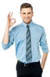 Executive Gesturing Perfect Sign Stock Photo