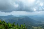 The Beauty Of The Sky When Light Hits The Clouds And Mountain Stock Photo