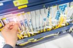 People Fix Node Fiber Optic In Network Room Stock Photo