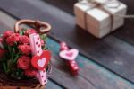 Heart-shaped In Basket On Wooden Stock Photo