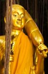 Golden Standing Buddha Statue Stock Photo