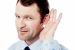 Corporate Executive Hold Hand Near Ear Stock Photo