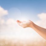 Hands Of Little Girl On Natural Background Stock Photo