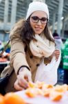 Young Beautiful Woman Shopping Fruit In A Market Stock Photo