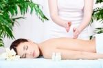 Woman On Back Massage Stock Photo