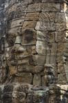 Ancient Stone Faces Of King Jayavarman Vii At The Bayon Temple, Stock Photo