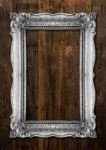 Old Silver Picture Frame On Wooden Background Stock Photo