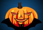 Halloween Pumpkin On Flying Bat Stock Photo