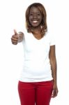 African Girl Gesturing Thumbs Up Stock Photo