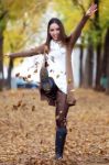 Beautiful Girl Having Fun In The Autumn Stock Photo