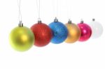 Multiple Hanging Christmas Ball On White Background Stock Photo