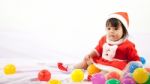 Little Girl With Santa Costume Stock Photo