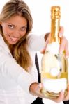 Young Lady Holding Champagne Bottle Stock Photo