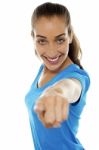 Lady Pointing Her Finger Towards The Camera Stock Photo