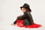 Little Girl Fashion Model With Black Hat Stock Photo