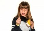 Eight Year Old Girl Playing With Maches Isolatet On White Stock Photo