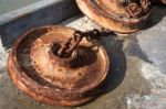 Rusting Anchors And Chains At Lyme Regis Harbour Stock Photo