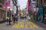 Unidentified People Walking In Myeongdong, South Korea Stock Photo